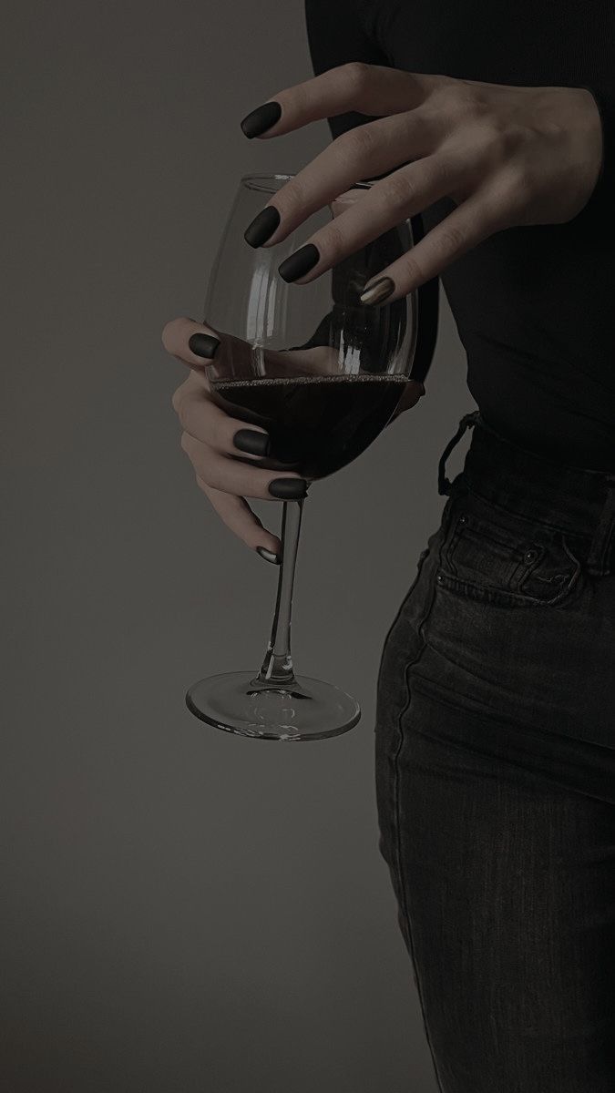 UBC image of woman holding glass of wine